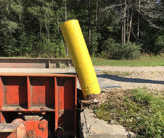 Truck Scale Guide Post leans on scale